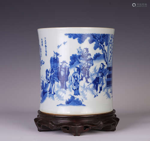 A CHINESE BLUE AND WHITE FIGURE STORY BRUSH POT