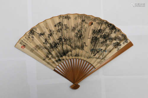 CHINESE FOLDING FAN WITH PAINTING OF FIGURE IN BAMBOO FOREST