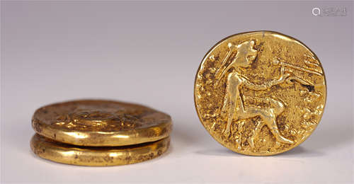 A SET OF CHINESE GILT BRONZE COINS