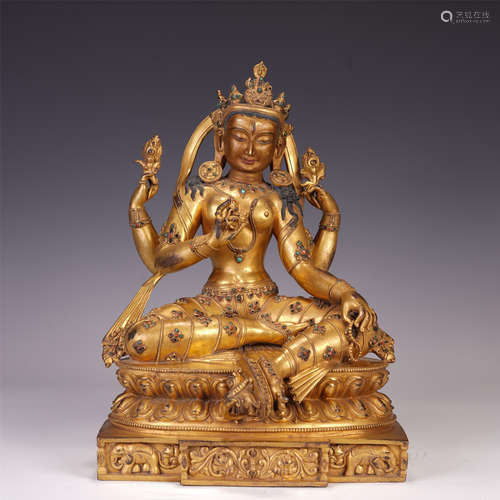 A CHINESE GILT BRONZE FOUR ARMS GUANYIN SEATED STATUE