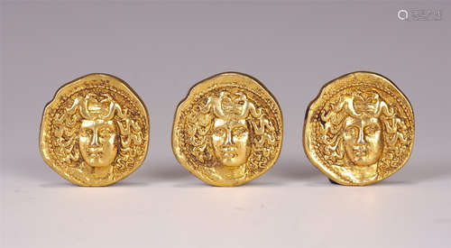 A SET OF CHINESE GILT BRONZE COINS