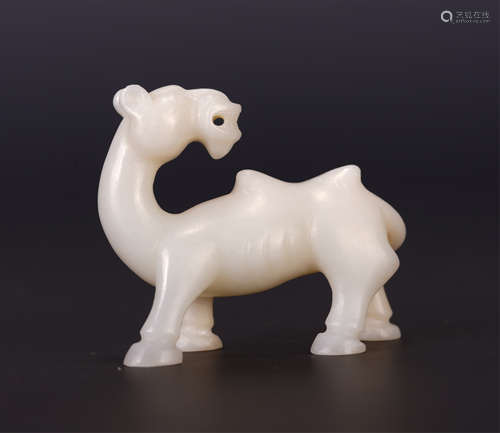 A CHINESE STANDING BEAST WHITE JADE PAPERWEIGHT