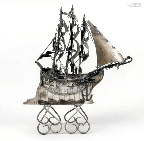 Miniature sailing ship with full sa