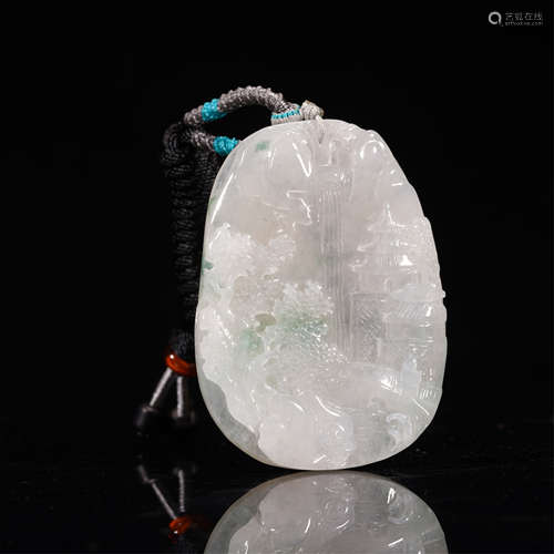 A CHINESE CARVED LANDSCAPE JADEITE PENDANT