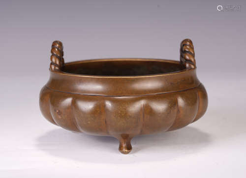 A CHINESE BRONZE TRIPOD ROUND CENSER