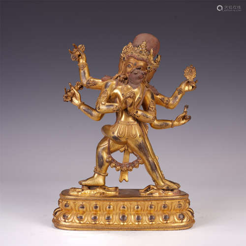 A CHINESE GILT BRONZE BUDDHIST GUARDIAN STANDING STATUE