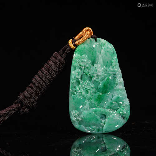 A CHINESE CARVED PINR TREE JADEITE PENDANT