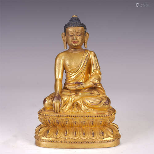 A CHINESE GILT BRONZE SAKYAMUNI BUDDHA SEATED STATUE