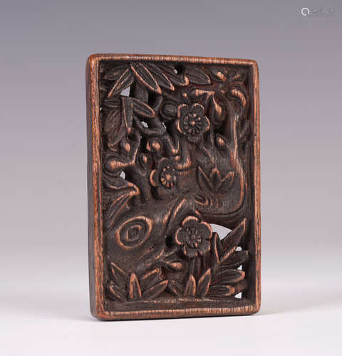 A CHINESE AGARWOOD PLAQUE WITH FLOWER AND BIRD PATTERN OPENWORK CARVING