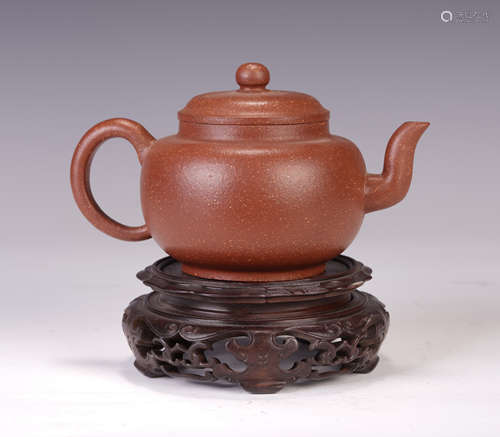 A CHINESE RED MUD ZISHA TEAPOT