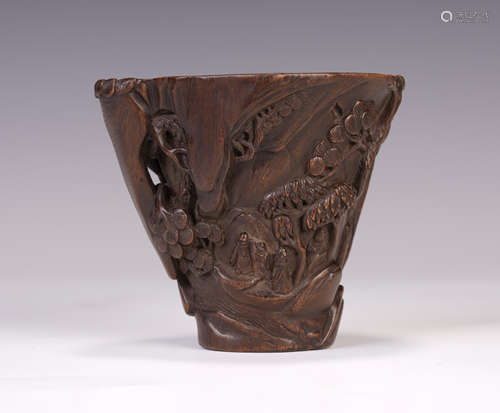 A CHINESE CARVED SCHOLAR'S MOTIF AGARWOOD CUP