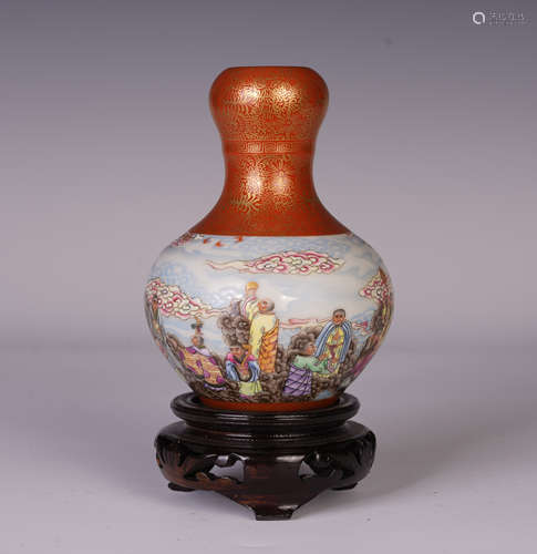 A CHINESE FAMILLE ROSE IMMORTAL PATTERN GARLIC MOUTH BOTTLE VASE