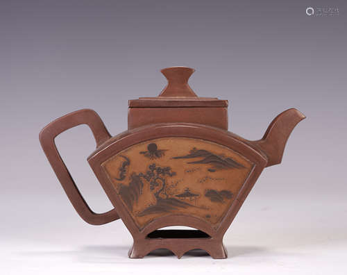 A CHINESE PURPLE MUD FAN SHAPE TEAPOT