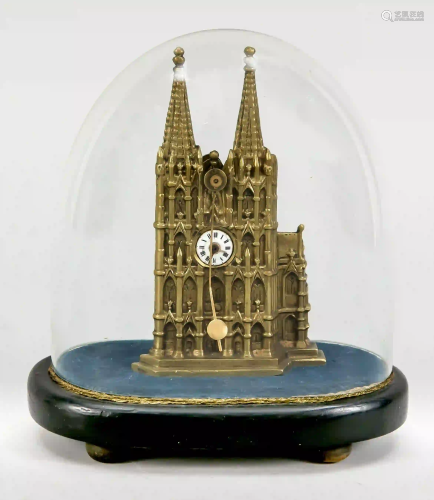 small table clock under glass dome