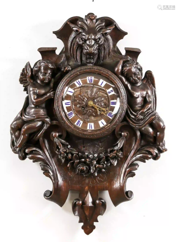 Wall clock carved dark wood with 2