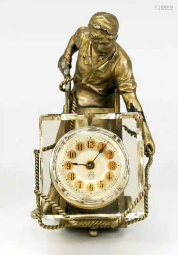 Table clock, man drives out ice blo