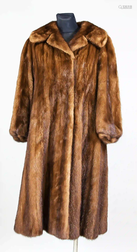 Ladies mink coat, dark brown. On a