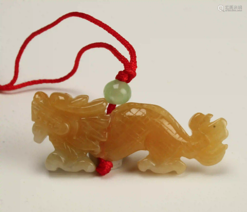 SMALL CARVED JADE DRAGON PENDANT