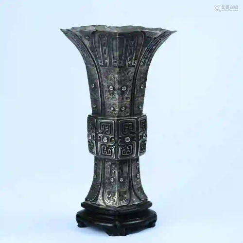A Taotie Paattern Silver Beaker Vase