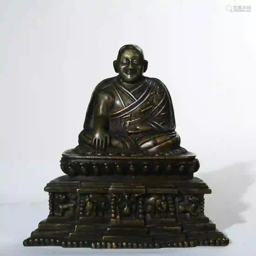 A Copper Buddha Statue