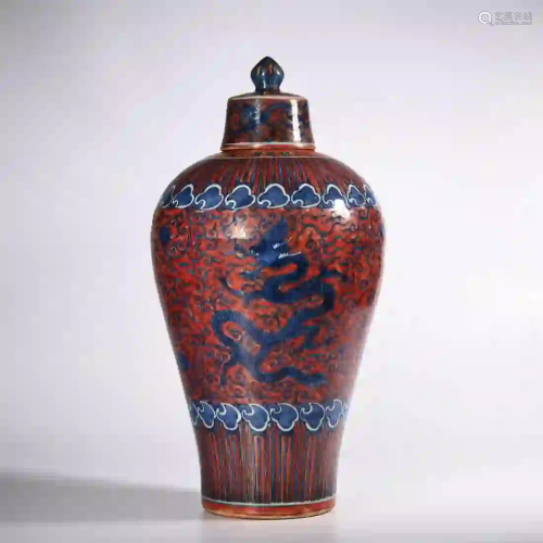 A Red Ground Interlocking Lotus and Dragon Porcelain