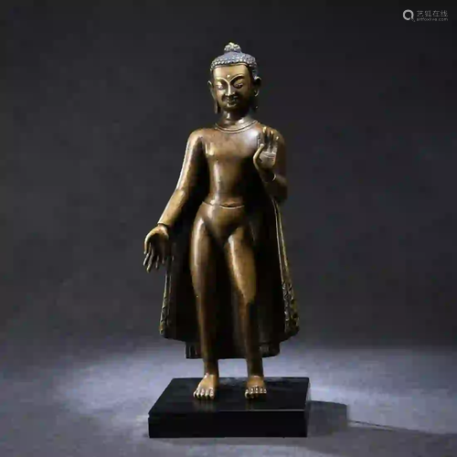 A Copper Standing Sakyamuni Statue