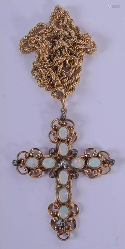 AN ANTIQUE 9CT GOLD AND OPAL PENDANT with 9ct gold