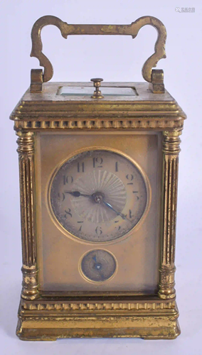 A 19TH CENTURY FRENCH BRASS REPEATING CARRIAGE CLOCK