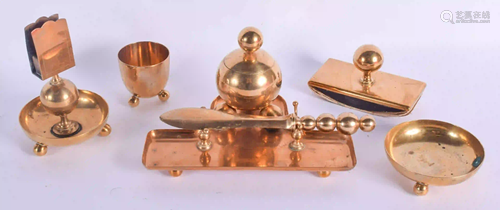 AN ART DECO BRASS DESK SET. (6)