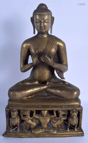 A LARGE 19TH CENTURY INDIAN BRONZE FIGURE OF A SEATED