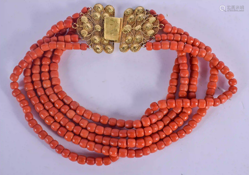 A LARGE 18CT GOLD CARVED CORAL NECKLACE. 289 grams. 45