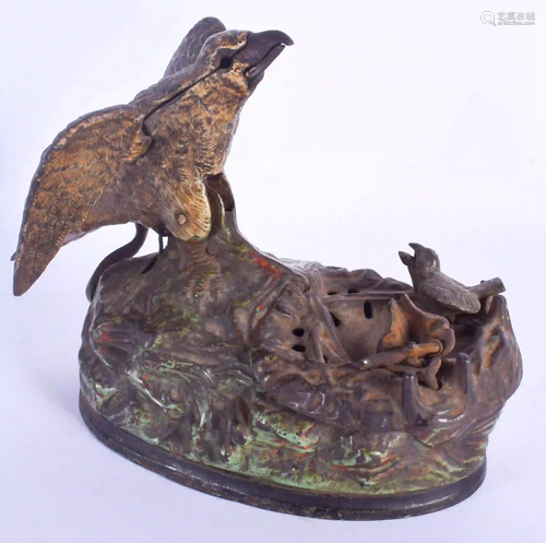 A RARE 19TH CENTURY PAINTED CAST IRON TIPPING BIRD