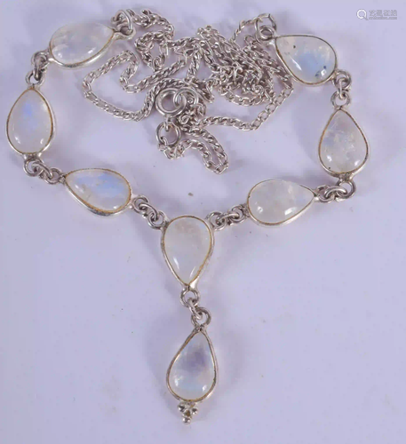 AN EDWARDIAN 9CT GOLD MOONSTONE NECKLACE. 8 grams.…