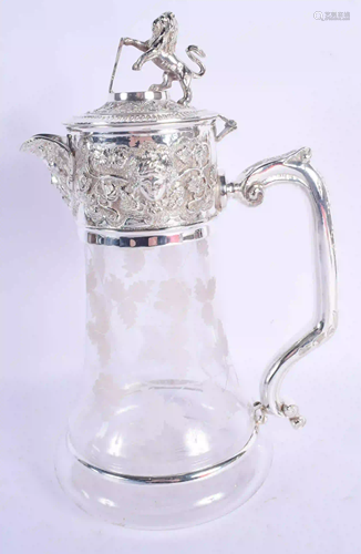 A SILVER PLATED GLASS CLARET JUG. 28 cm high.