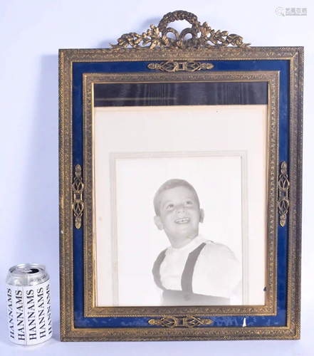 A LARGE NEO CLASSICAL BRASS PHOTOGRAPH FRAME. 45 cm x