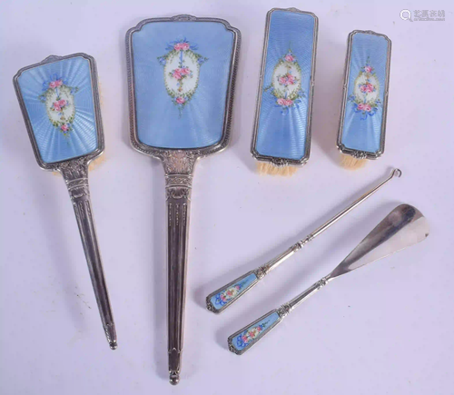 AN ART DECO SILVER AND ENAMEL DRESSING TABLE SET. 1220