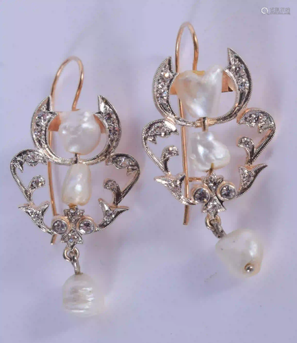 A PAIR OF 14CT GOLD BAROQUE PEARL AND DIAMOND EA…