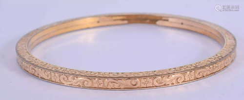 A VICTORIAN GOLD PLATED BANGLE. 8 cm diameter.