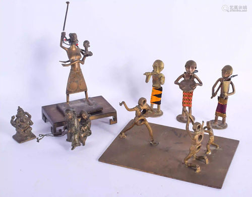 EIGHT AFRICAN BRONZE FIGURES. Largest 22 cm x 8 cm. (8)