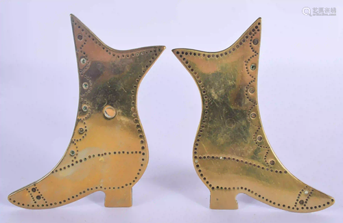 A PAIR OF ANTIQUE FOLK ART BRASS SHOES. 11 cm x 5 cm.