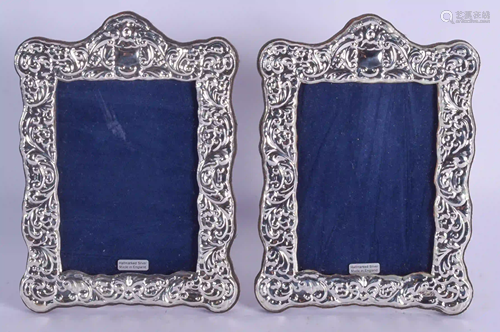 A PAIR OF SILVER PHOTOGRAPH FRAMES. 20 cm x 17…