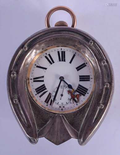 AN ANTIQUE SILVER HORSE SHOE CLOCK. 12 cm x 9 cm.