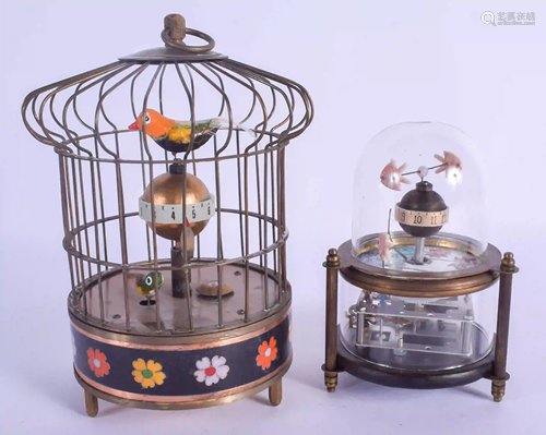 TWO AUTOMATON CLOCKS in the form of an aquarium and