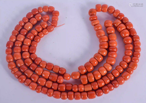 A LONG 18CT GOLD AND CORAL NECKLACE. 231 grams. 30 cm