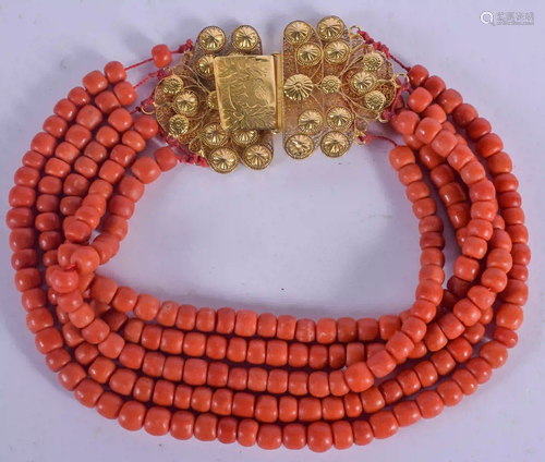 A LONG 18CT GOLD AND CORAL NECKLACE. 240 grams. 30 cm