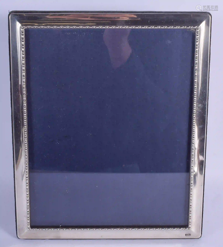 A MODERN SILVER PHOTOGRAPH FRAME. Sheffield 199…