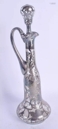 AN ART NOUVEAU SILVER OVERLAID GLASS DECANTER AND