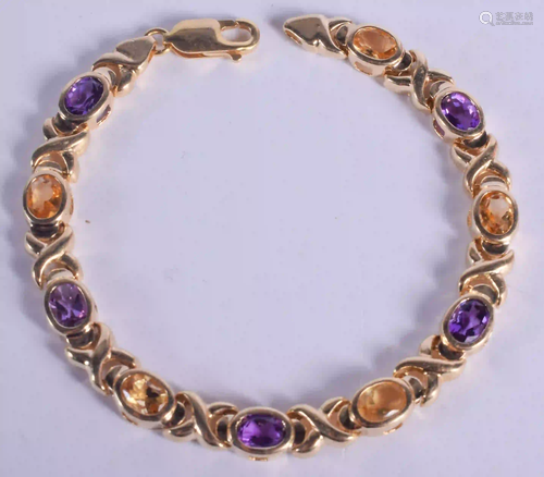 A 14CT GOLD AMETHYST AND CITRINE BRACELET. 14 grams. 18