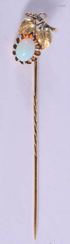 A GOLD AND OPAL STICK PIN. 2 grams. 6.5 cm long.