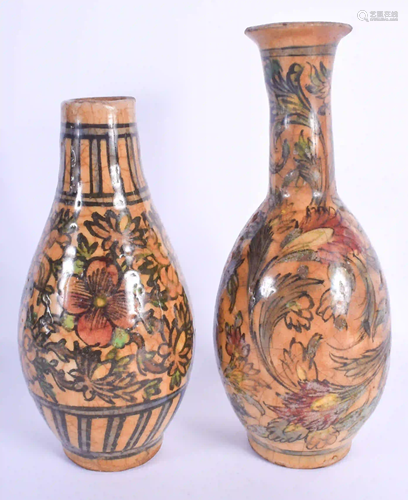 TWO 19TH CENTURY PERSIAN FAIENCE VASES. Largest 27 cm